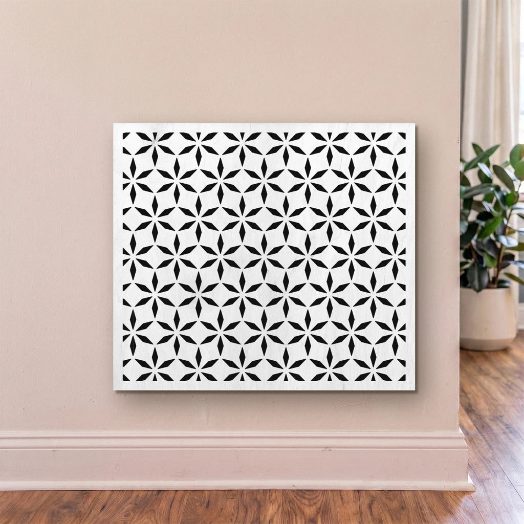 Decorative wall panel with geometric pattern on a beige wall.