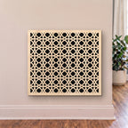 Decorative wall panel with geometric pattern on a beige wall.