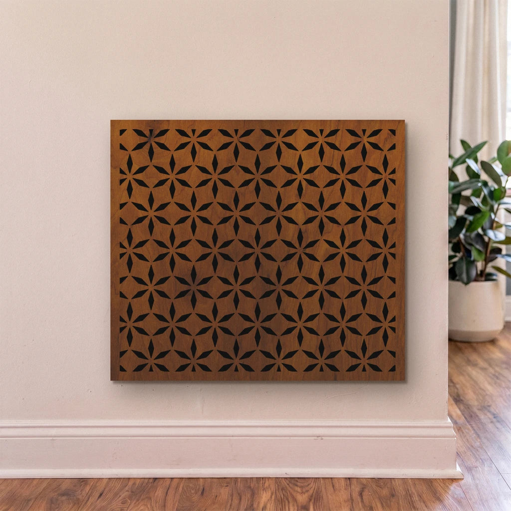 Wooden wall art panel with geometric pattern on a beige wall.