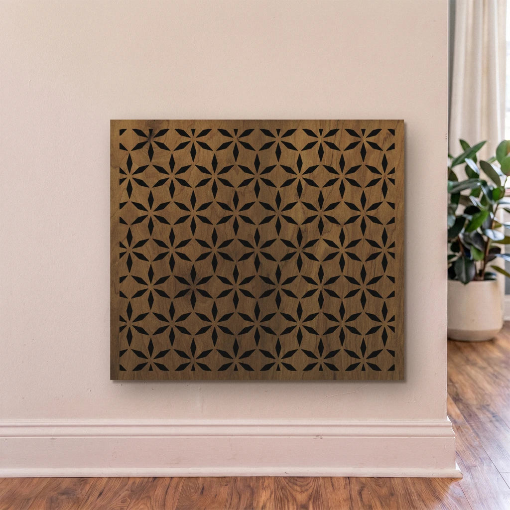 Decorative wall panel with geometric pattern on a plain wall.